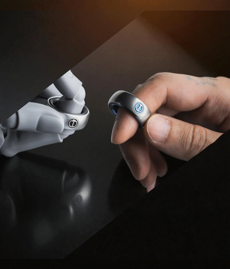 Spy Wars Fidget Ring Mechanic-I – Human vs Robot Spy Wars Fidget Ring Mechanic-I by StressCrate – comparison of human and robotic hand holding titanium blue ring